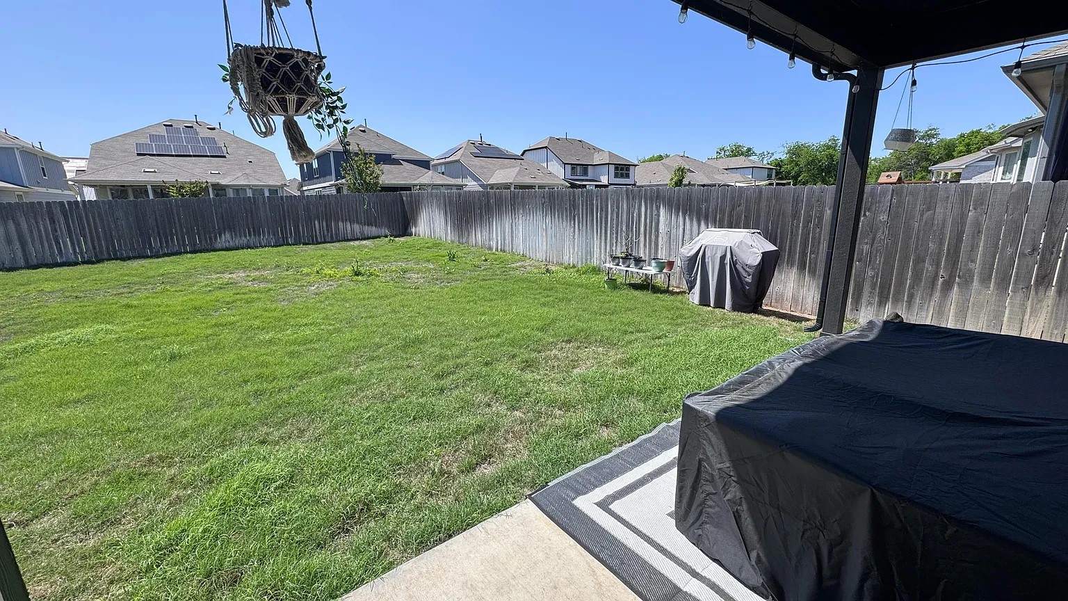 126 Georgia Lace Trail Georgetown, TX 78626 - Photo 32 of 32 a view of a backyard with a garden and deck