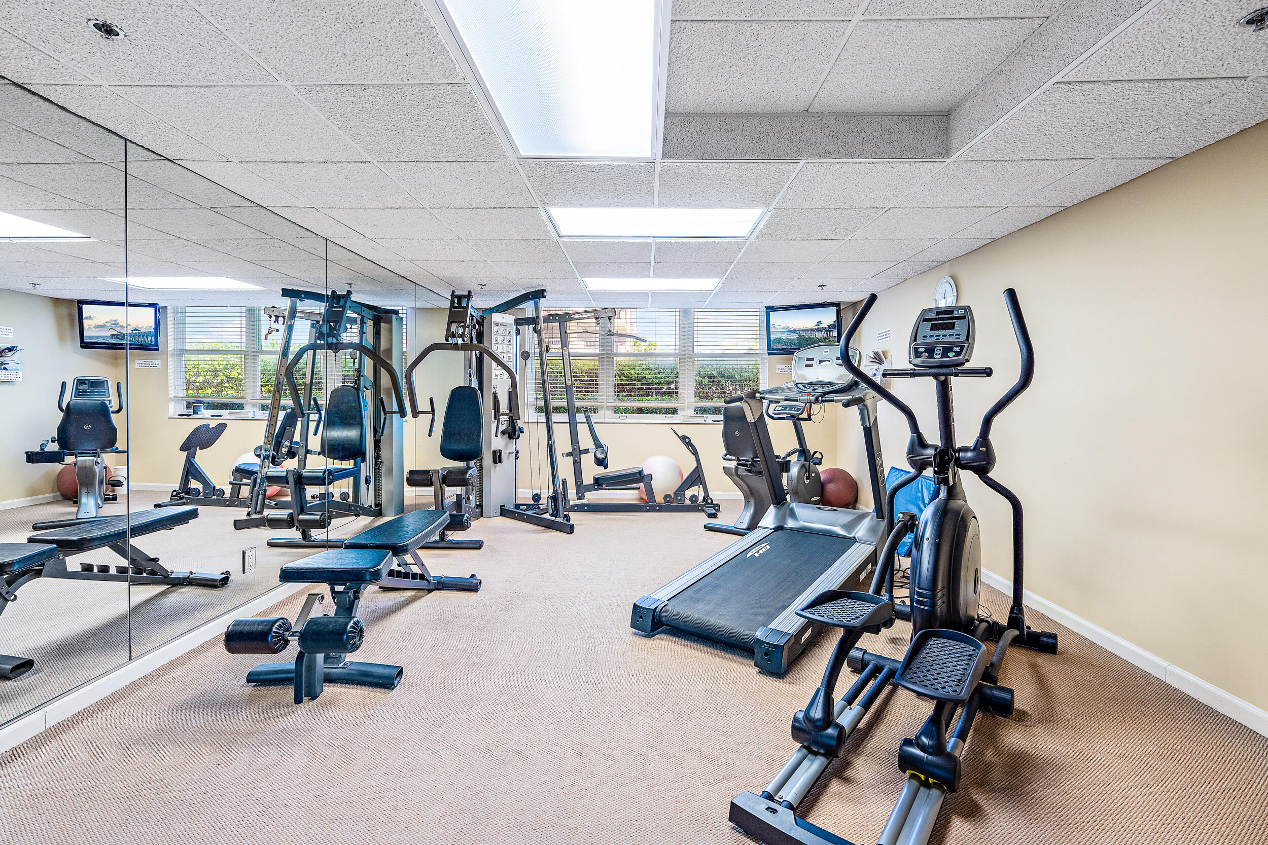 500 Ocean Drive, Unit E2A Juno Beach, FL 33408 - Photo 36 of 40 a view of a room with gym equipment