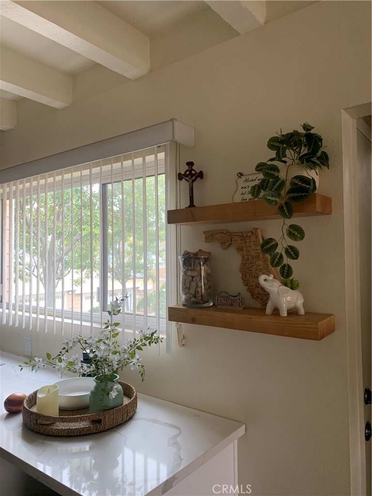 600 West Lambert Road, Unit 44 La Habra, CA 90631 - Photo 2 of 10 a living room with furniture and a fireplace