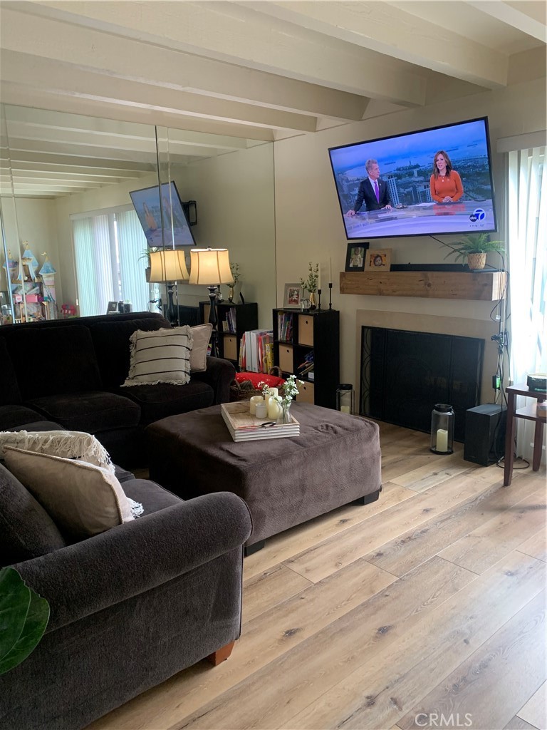 600 West Lambert Road, Unit 44 La Habra, CA 90631 - Photo 6 of 10 a living room with furniture and a fireplace
