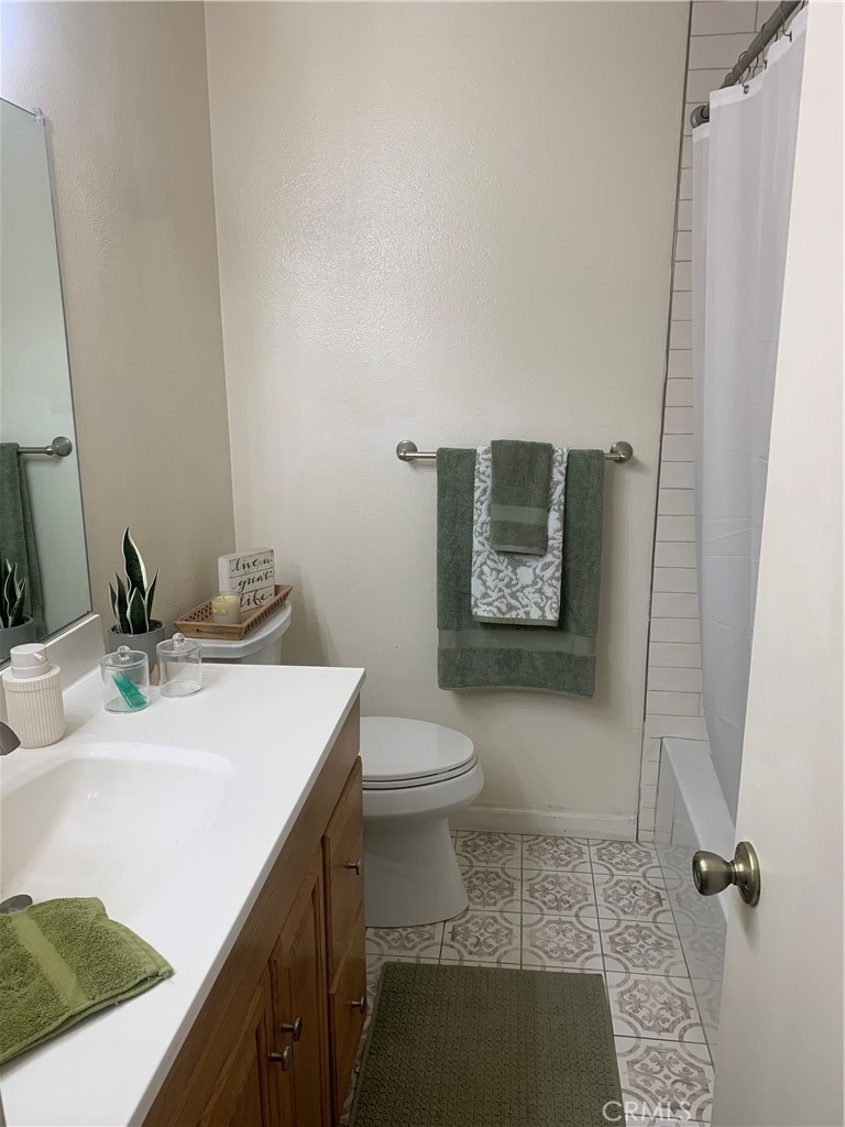 600 West Lambert Road, Unit 44 La Habra, CA 90631 - Photo 8 of 10 a bathroom with a sink toilet and vanity