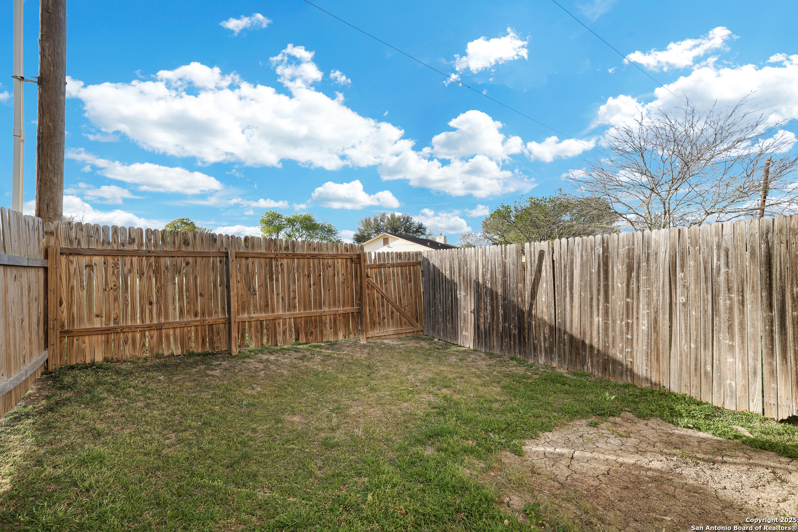 10023 Vasso View, Unit 1 Converse, TX 78109 - Photo 24 of 27 a view of a backyard
