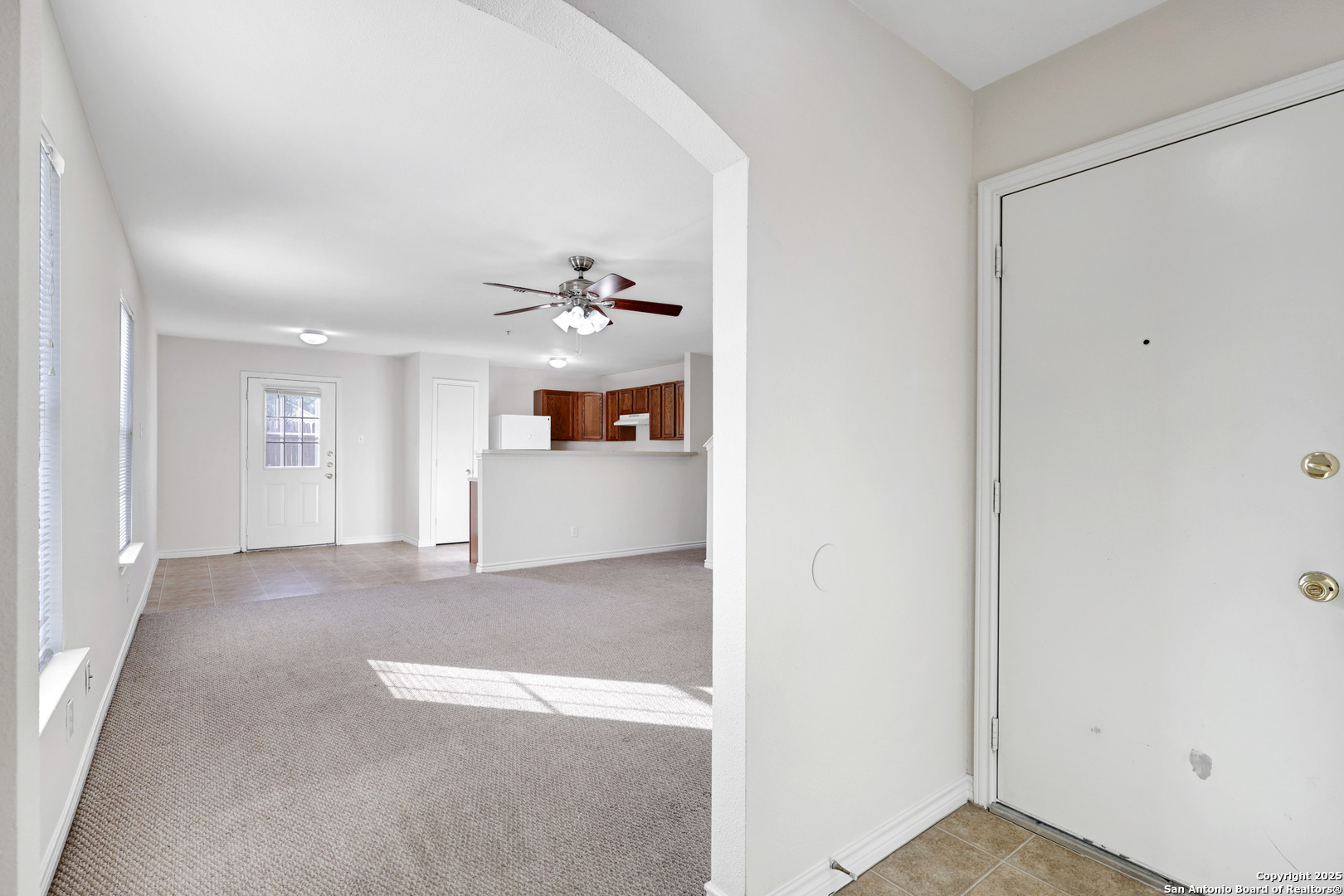 10023 Vasso View, Unit 1 Converse, TX 78109 - Photo 3 of 27 a view of a room with a kitchen