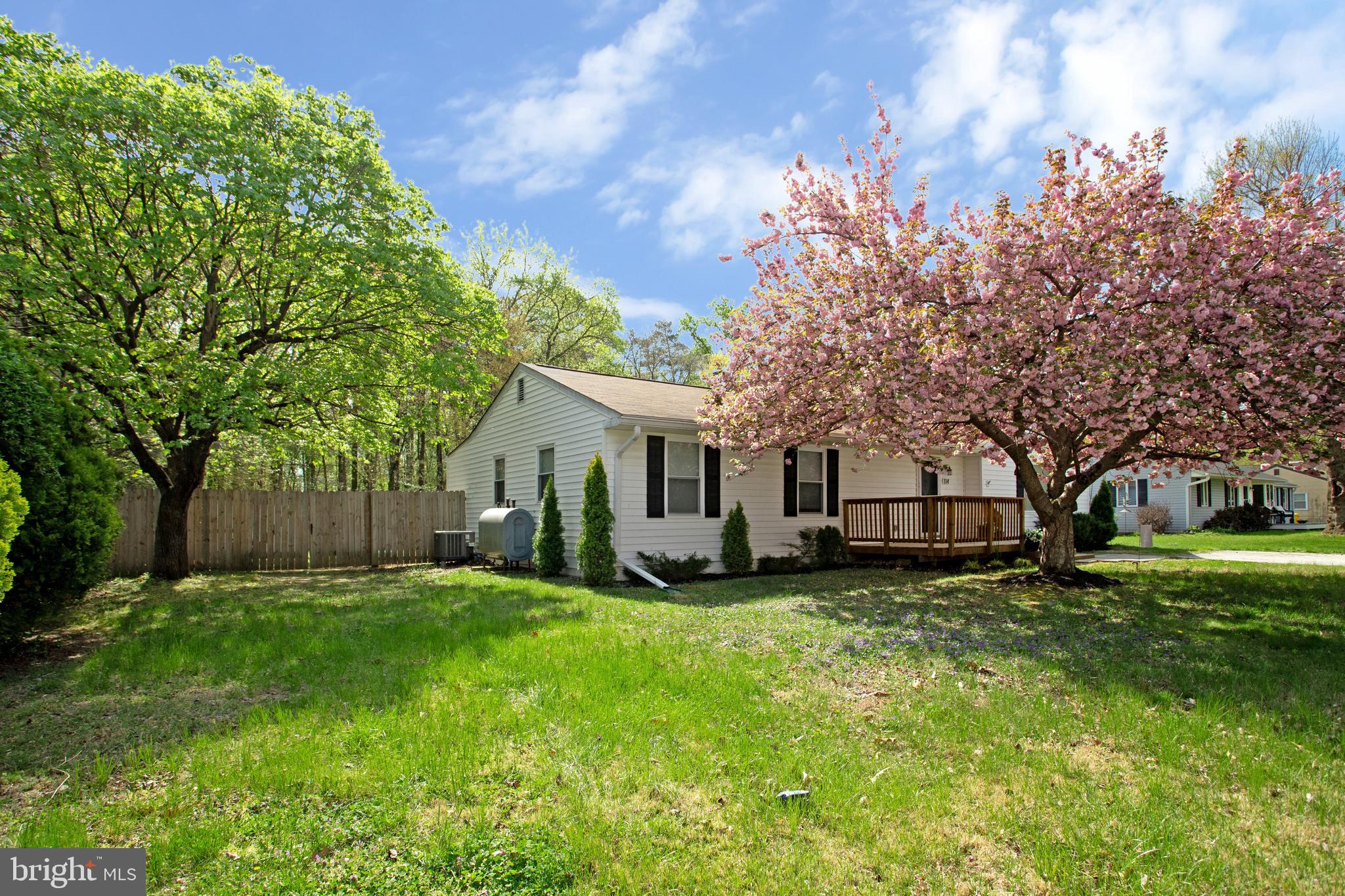 114 River Road Edgewater, MD 21037 - Photo 5 of 30 a view of a house with a yard