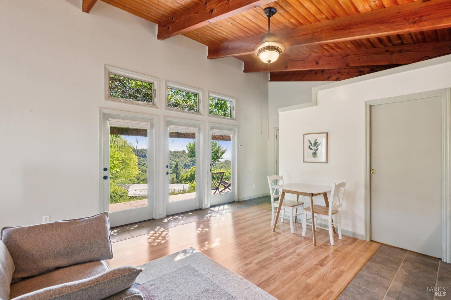6960 Round Oak Road Penngrove, CA 94951 - Photo 48 of 58 a living room with furniture and a wooden floor