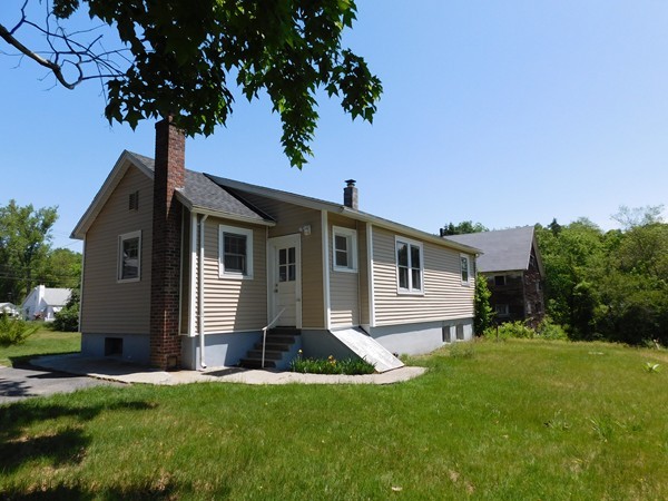 3267 Boston Road Wilbraham, MA 01095 - Photo 3 of 11 a front view of house with yard and green space