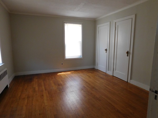 3267 Boston Road Wilbraham, MA 01095 - Photo 7 of 11 an empty room with wooden floor and windows