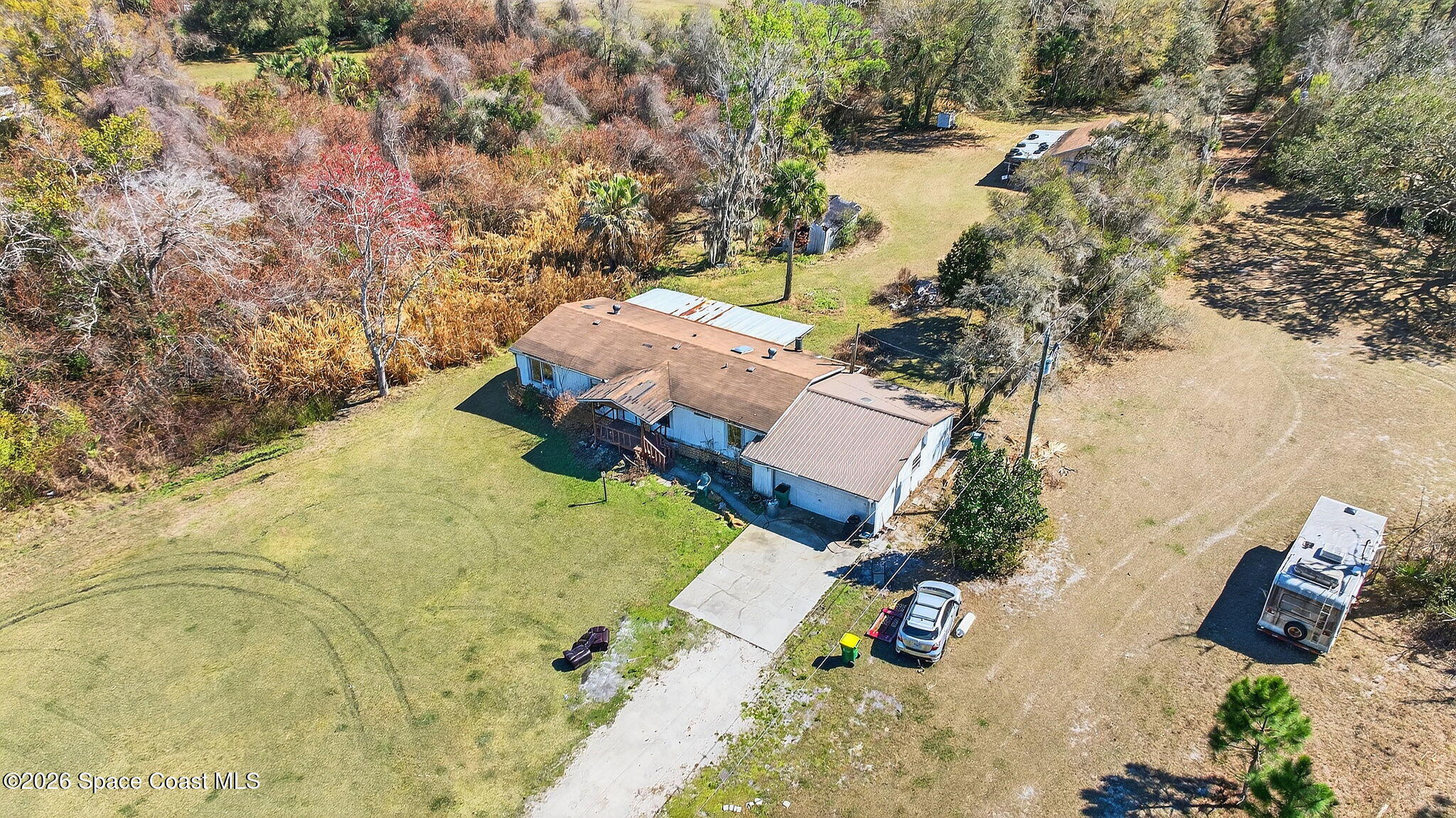 4305 April Lane Mims, FL 32754 - Photo 2 of 19 18-web-or-mls-DJI_0609