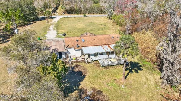 a view of yard with swimming pool