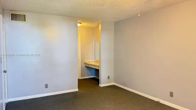 a view of a bathroom with a door