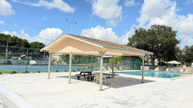 a view of street with parked cars