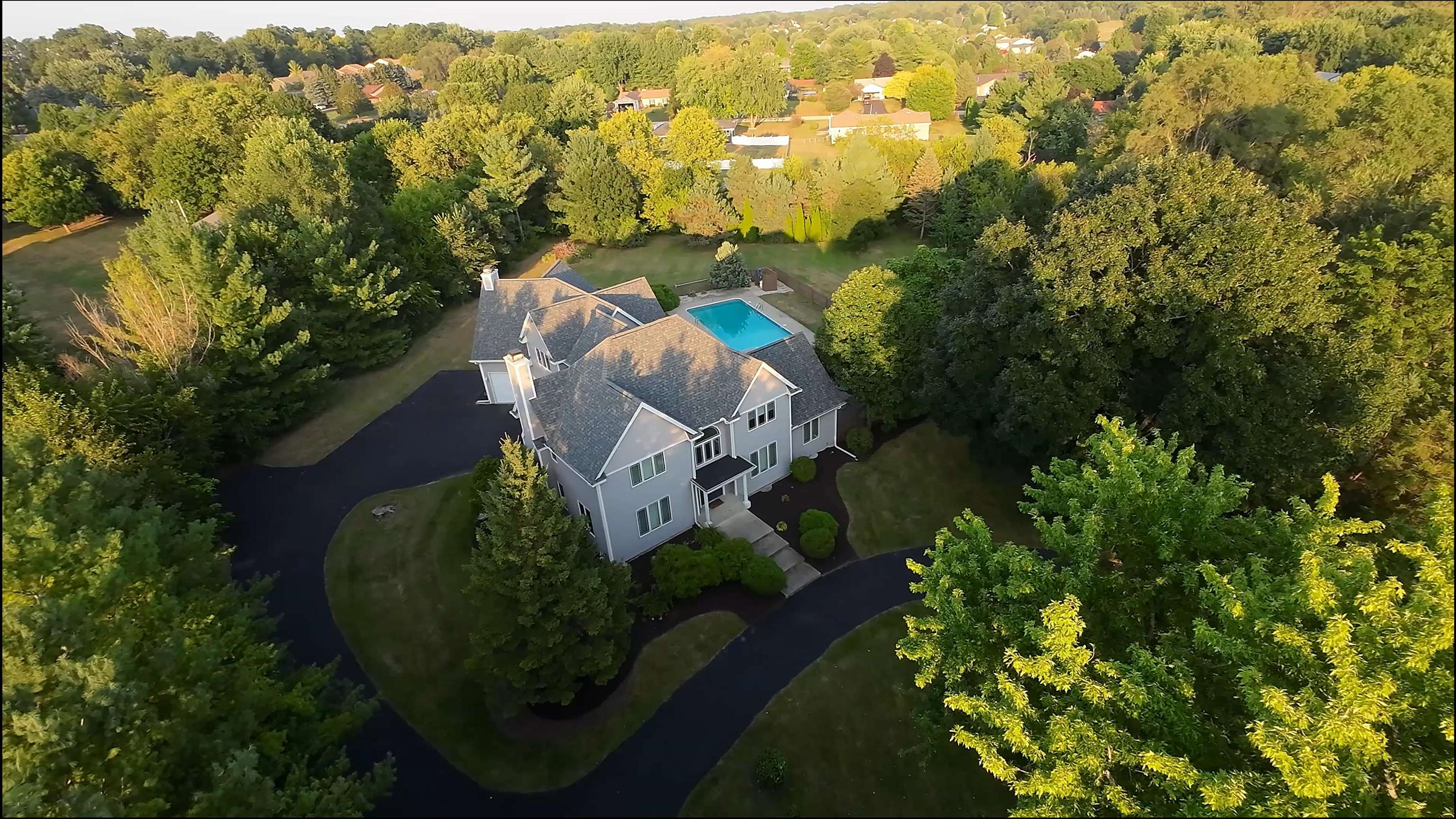 6210 Mc Donald Road Roscoe, IL 61073 - Photo 1 of 41 an aerial view of a house with a yard basket ball court and outdoor seating