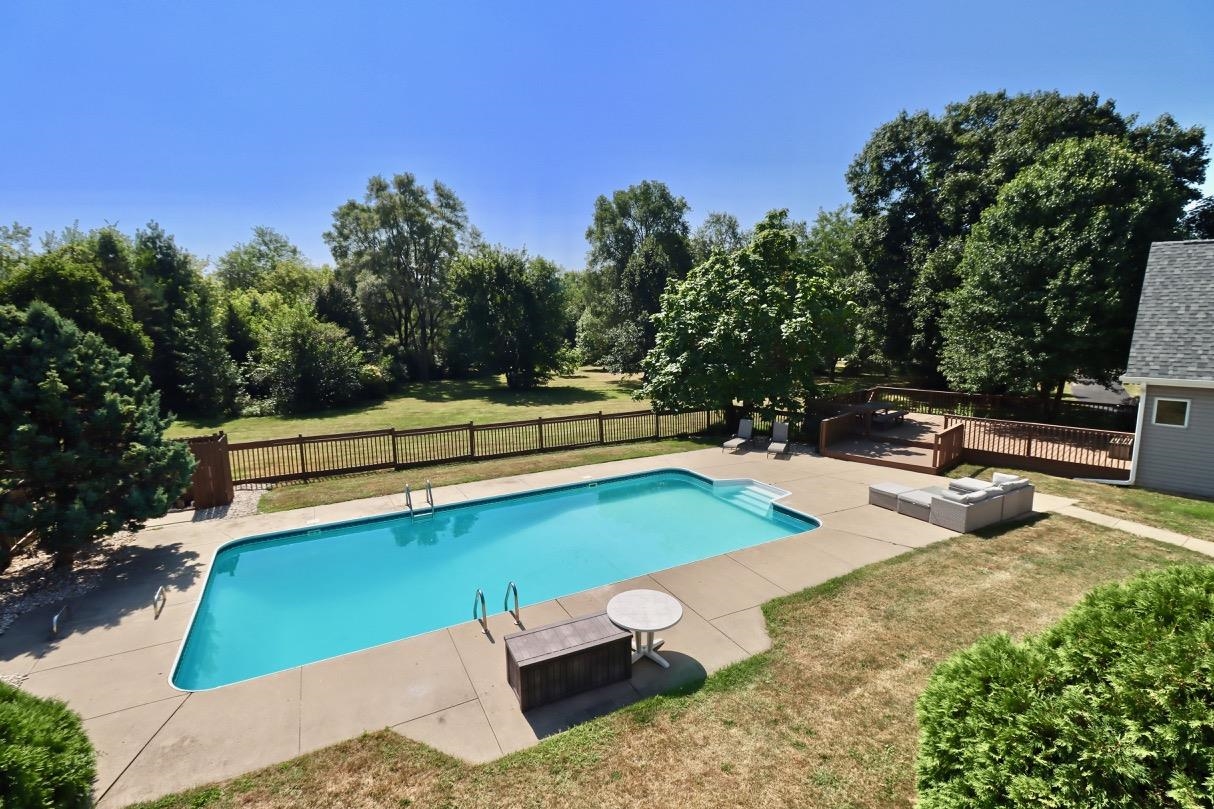 6210 Mc Donald Road Roscoe, IL 61073 - Photo 31 of 41 a backyard of a house with table and chairs