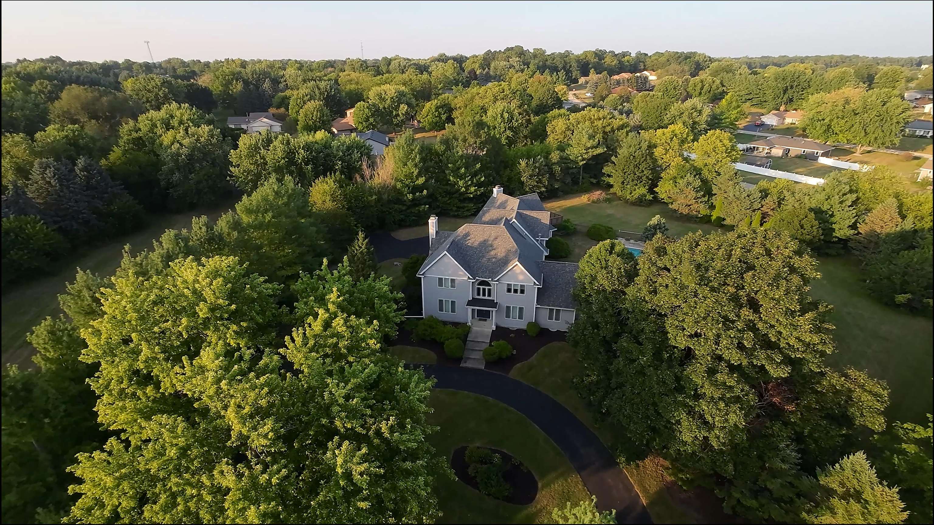 6210 Mc Donald Road Roscoe, IL 61073 - Photo 37 of 41 an aerial view of a house with a yard