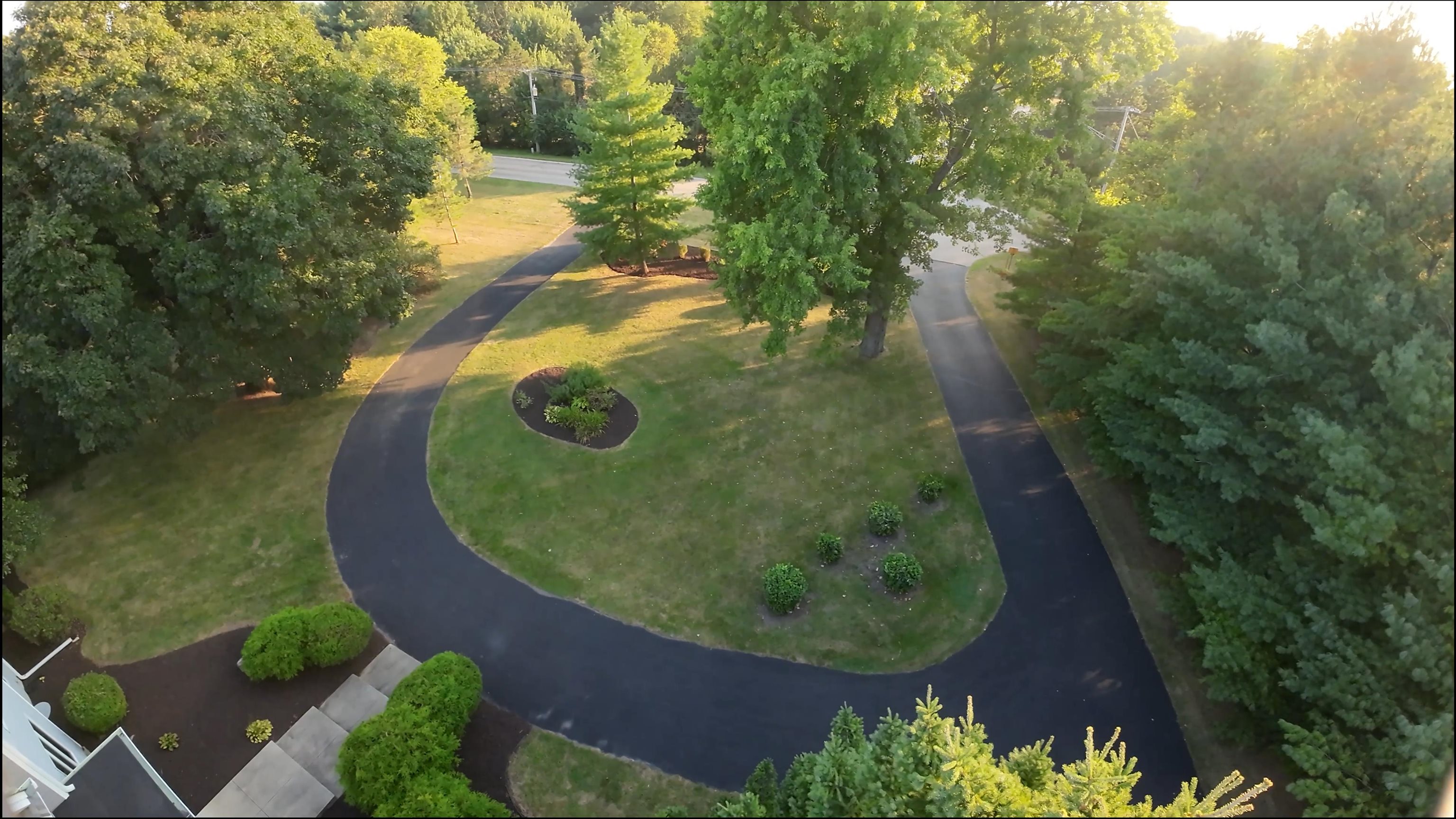 6210 Mc Donald Road Roscoe, IL 61073 - Photo 38 of 41 an aerial view of a house with a yard and trees all around