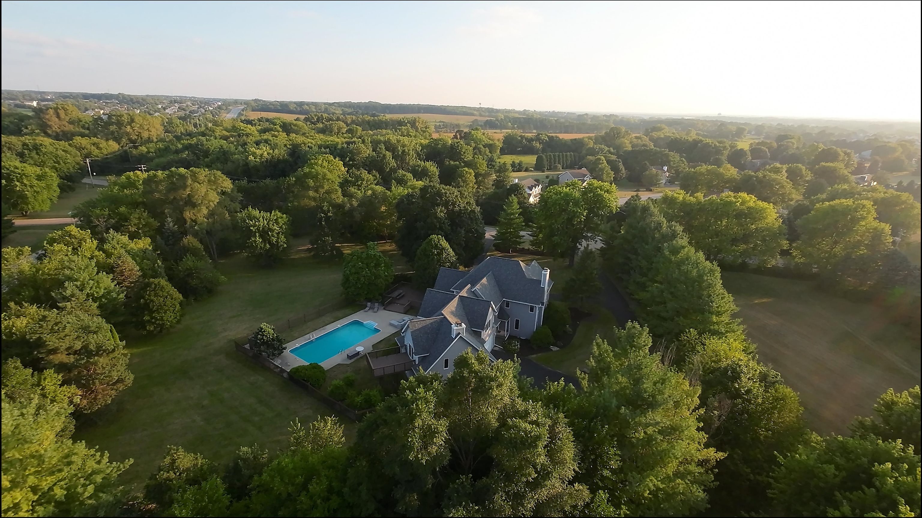 6210 Mc Donald Road Roscoe, IL 61073 - Photo 40 of 41 aerial view of a house with a yard