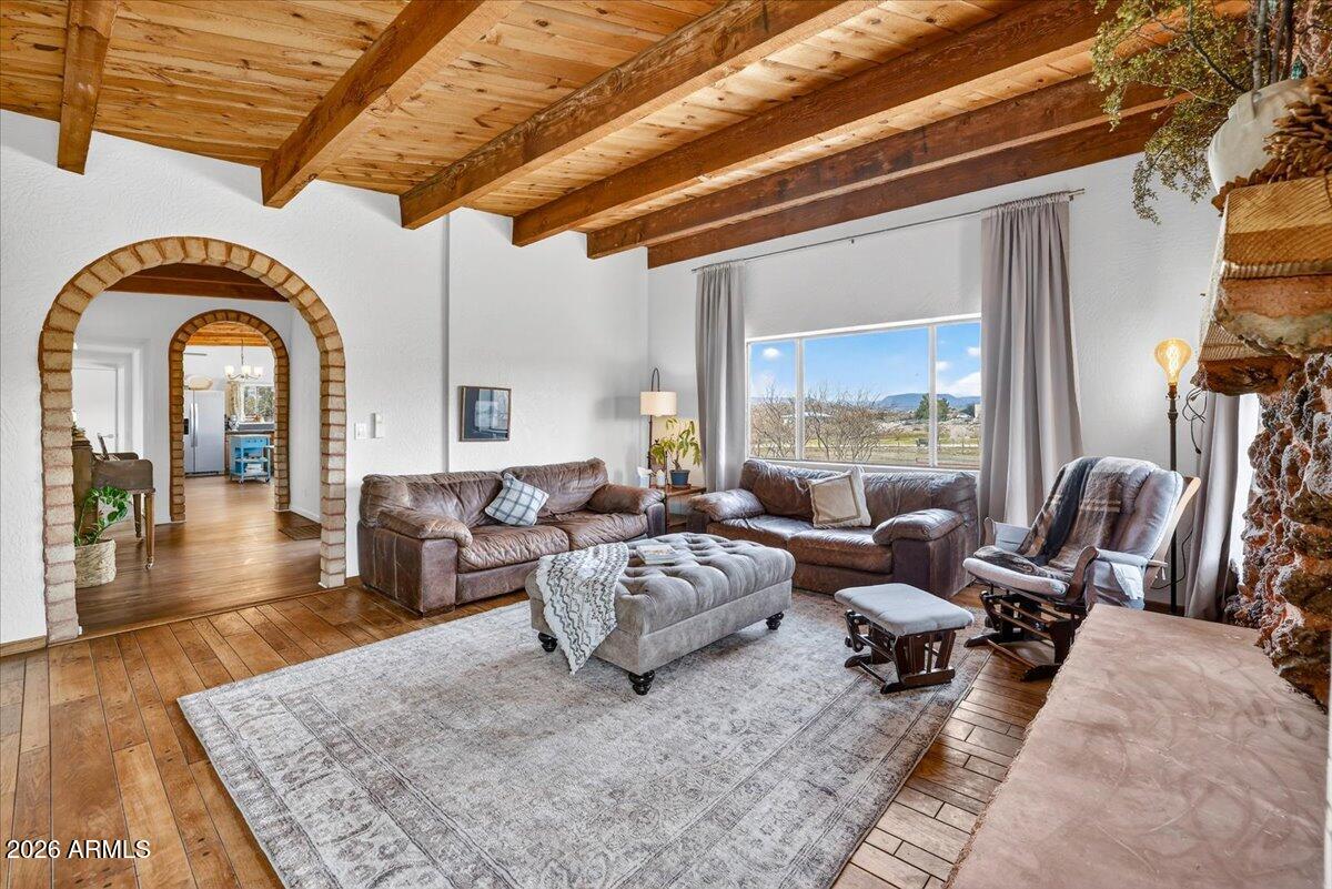 13505 East Rindone Lane Cornville, AZ 86325 - Photo 12 of 73 a living room with furniture and a large window