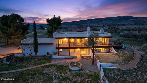 a view of a living room and bathroom