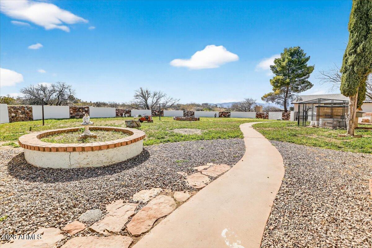 13505 East Rindone Lane Cornville, AZ 86325 - Photo 57 of 73 a view of a swimming pool with a yard and plants