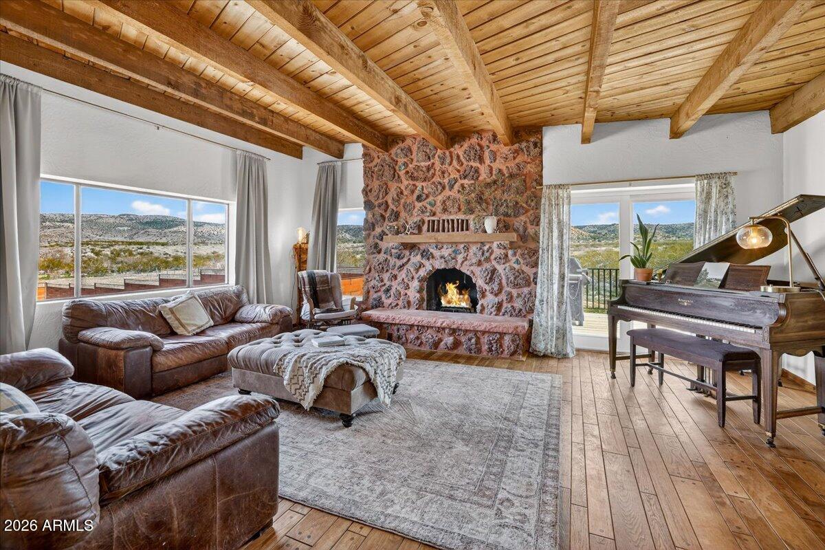 13505 East Rindone Lane Cornville, AZ 86325 - Photo 6 of 73 a living room with furniture and a fireplace