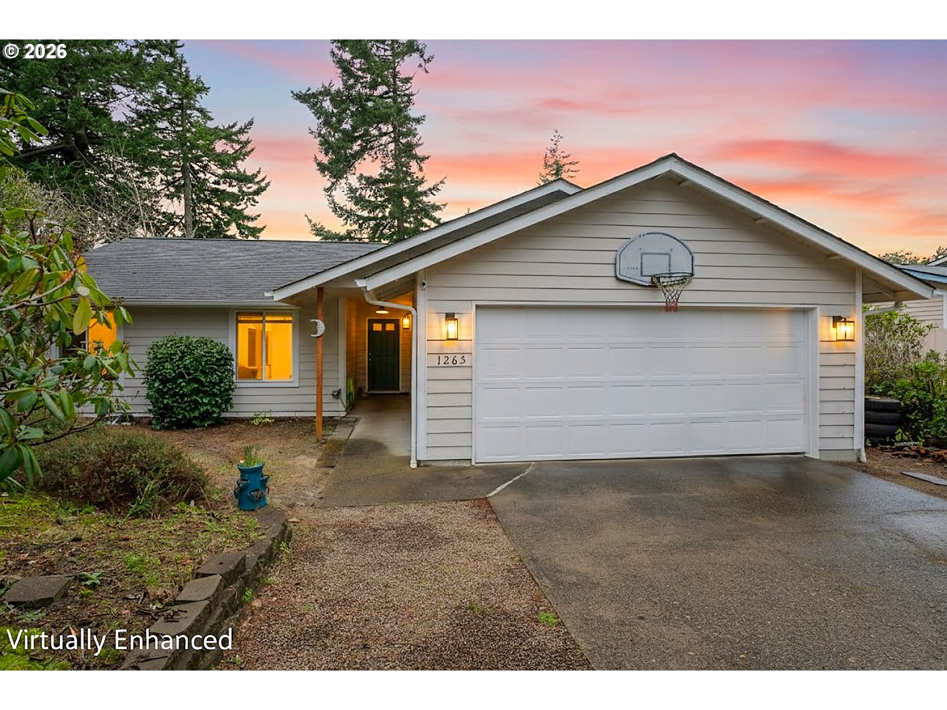 a view of a house with a yard
