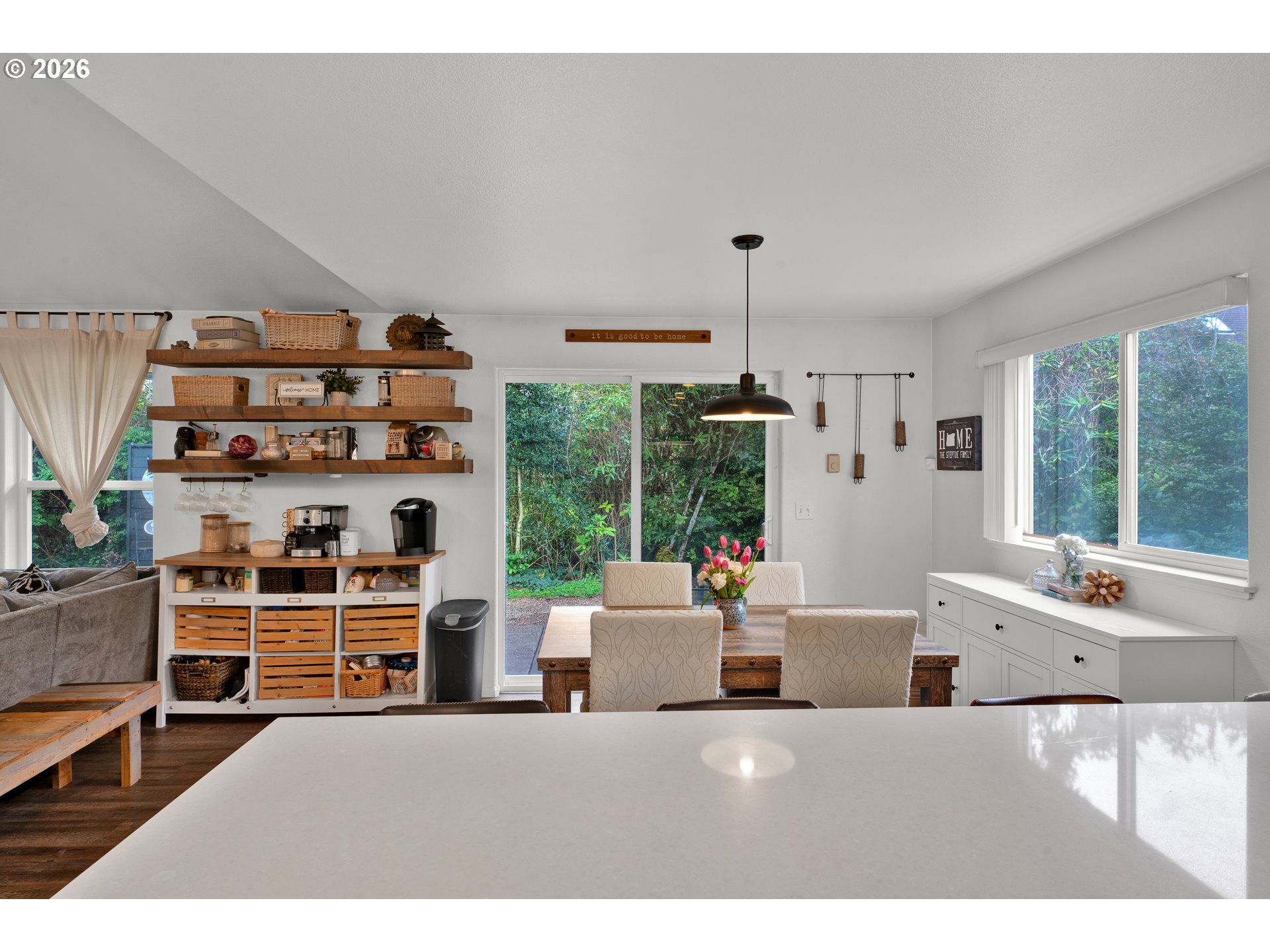1265 Laurel Street Florence, OR 97439 - Photo 13 of 42 a living room with furniture a flat screen tv and a large window