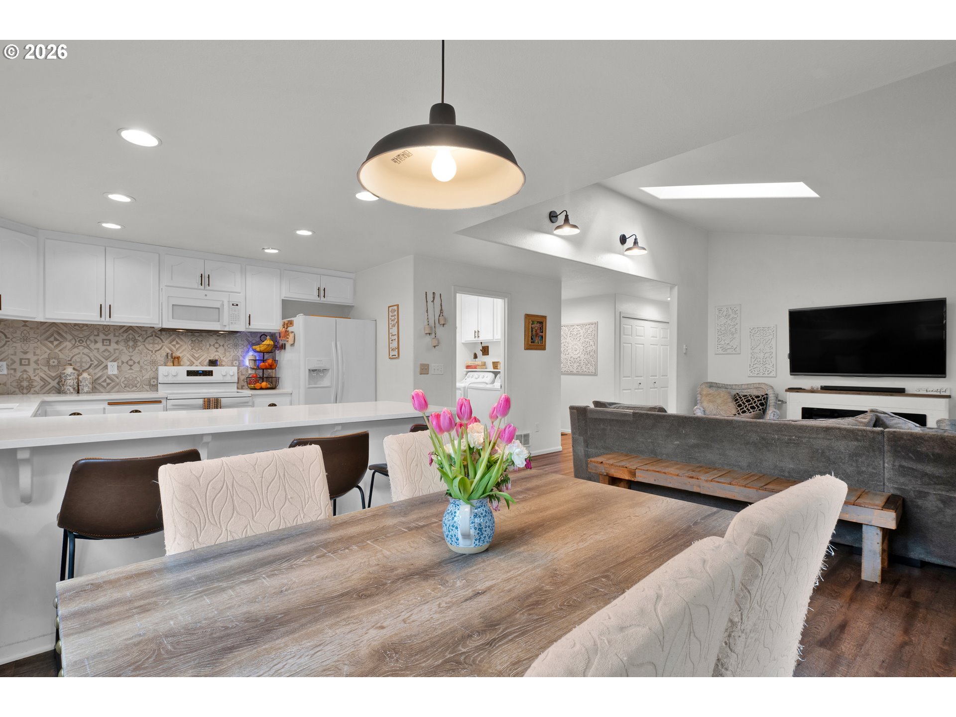 1265 Laurel Street Florence, OR 97439 - Photo 18 of 42 a view of living room kitchen with stainless steel appliances granite countertop living room