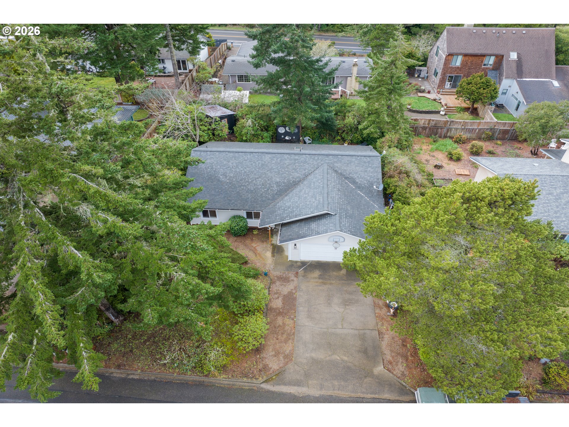 1265 Laurel Street Florence, OR 97439 - Photo 2 of 42 a aerial view of a house with a yard