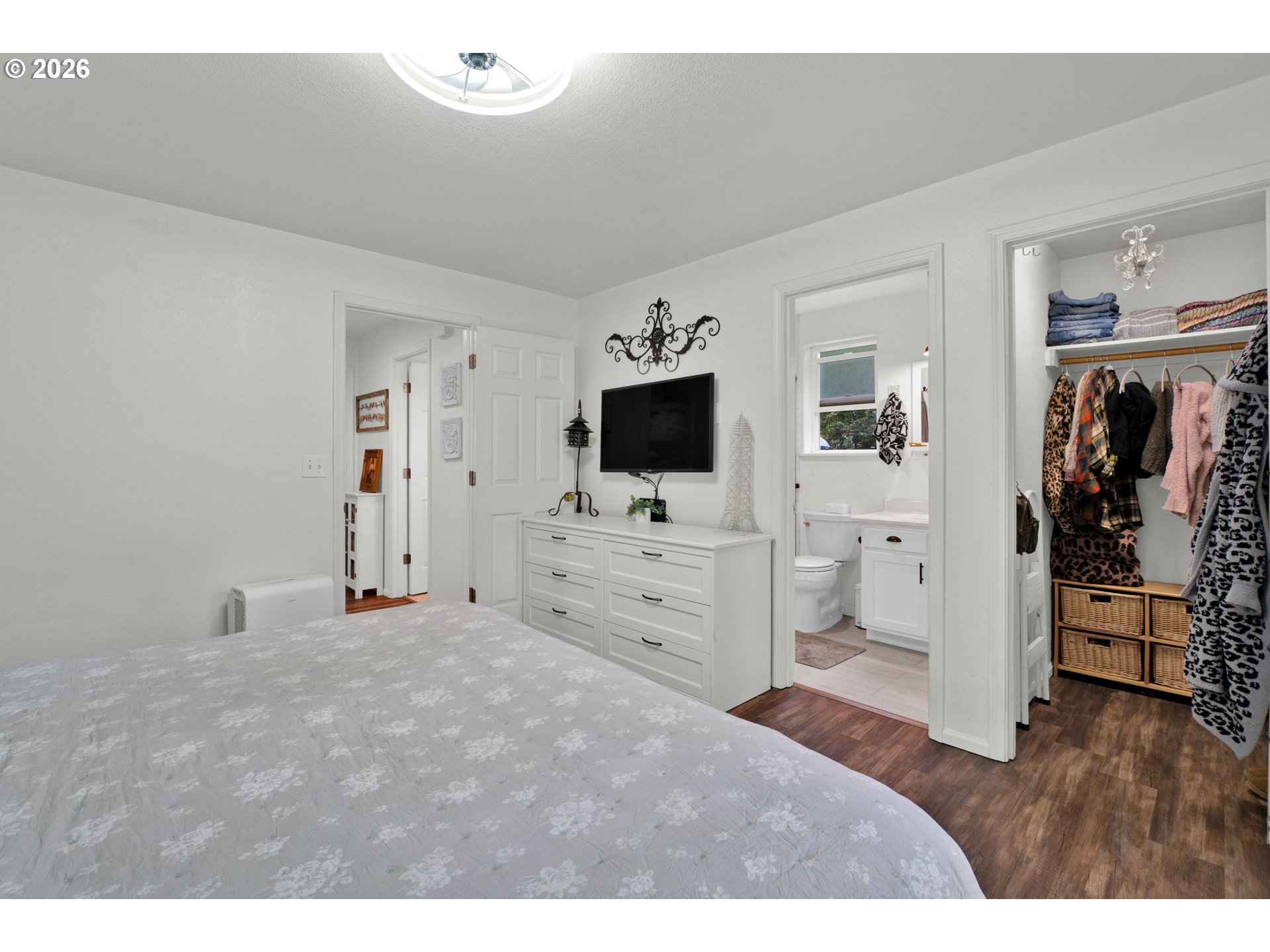 1265 Laurel Street Florence, OR 97439 - Photo 23 of 42 a view of a bedroom with flat screen tv and windows