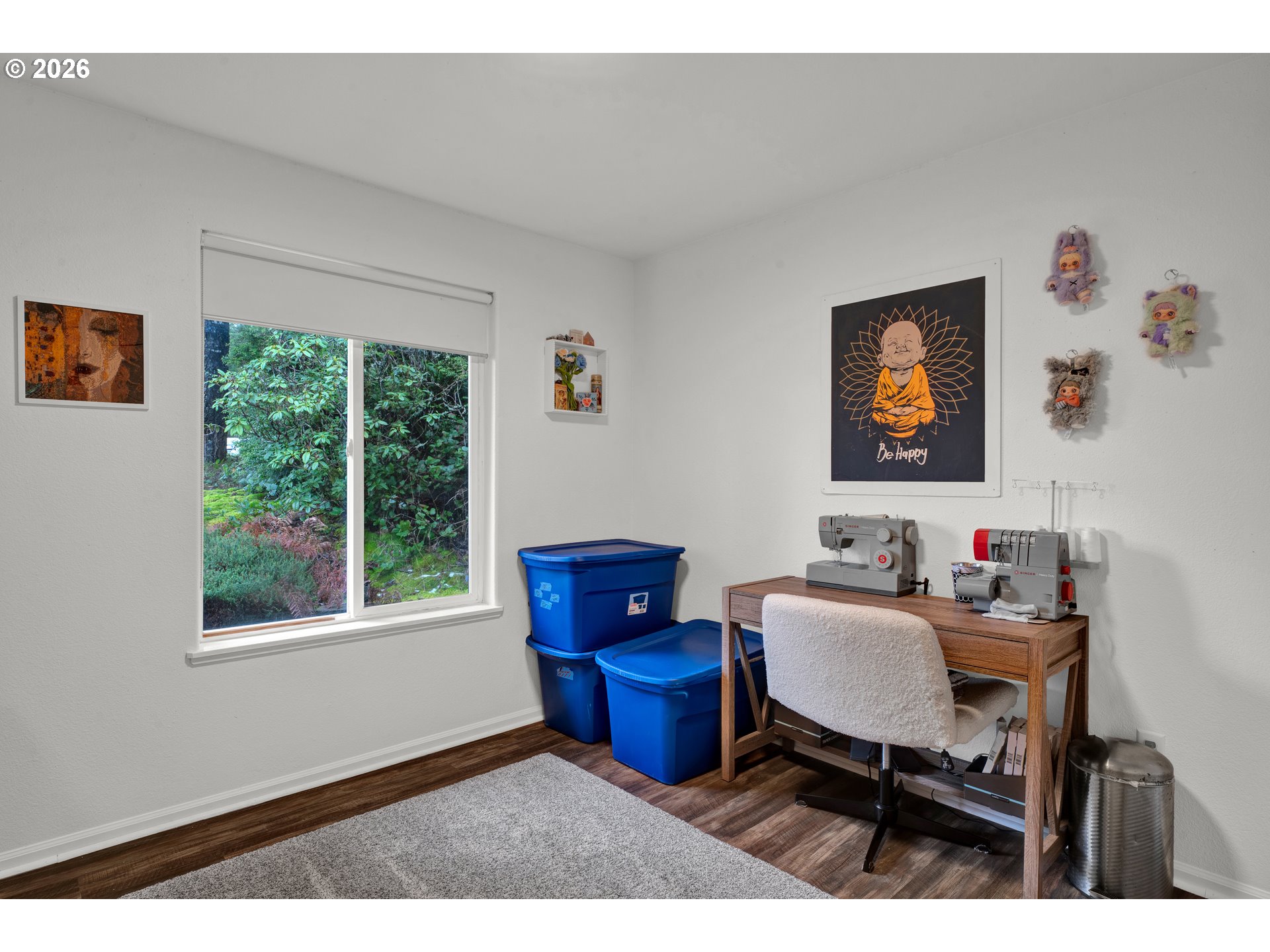 1265 Laurel Street Florence, OR 97439 - Photo 29 of 42 a living room with furniture a rug and a window