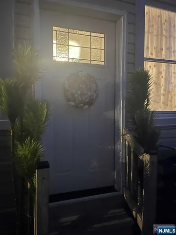 a view of balcony with wooden floor