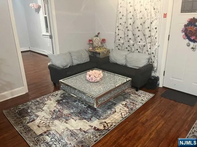 a living room with a rug
