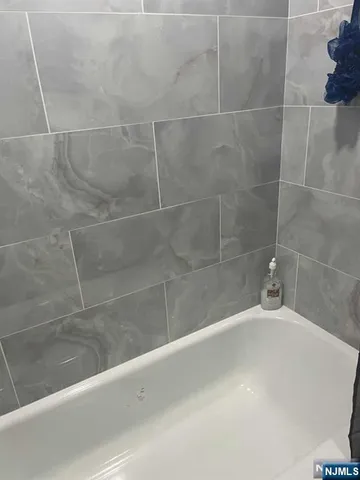 a bathroom with a bathtub