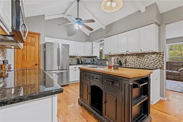 $350,000 | 9705 Northwest Hampton Woods Drive, Kansas City, MO 64152