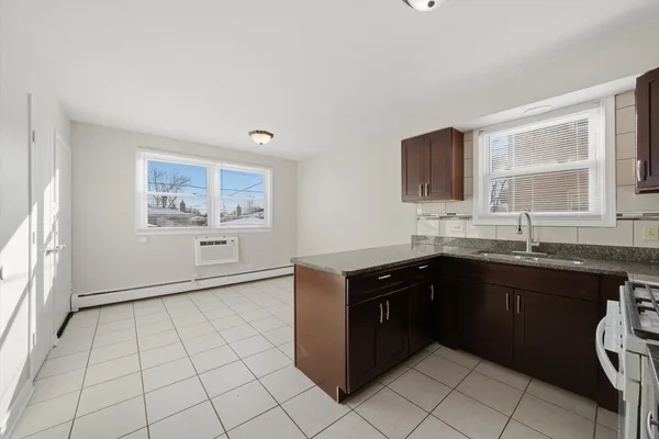 a kitchen with a cabinets and a sink