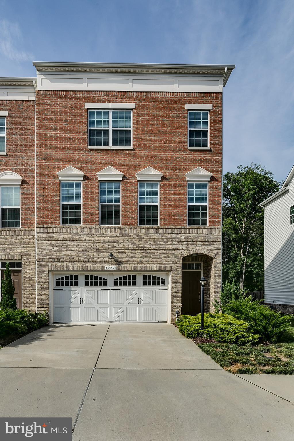 42251 Castle Ridge Square Ashburn, VA 20148 - Photo 1 of 29 Brick end unit with 2 car garage and driveway