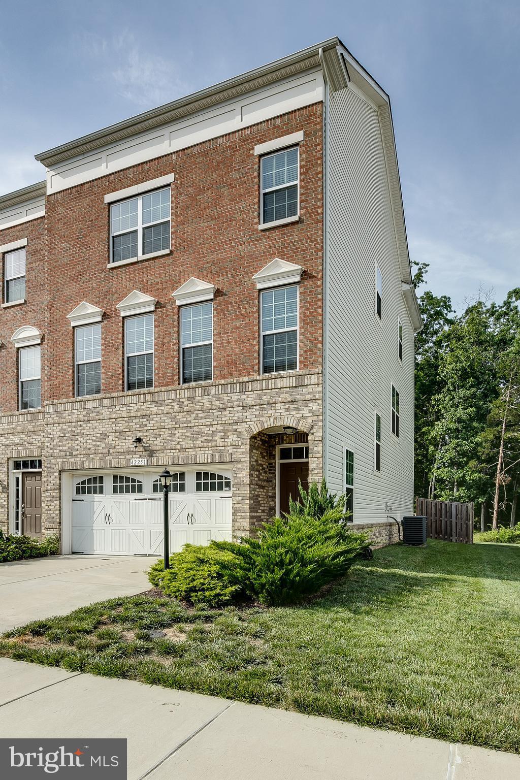 42251 Castle Ridge Square Ashburn, VA 20148 - Photo 2 of 29 Spacious brick end unit with garage and driveway