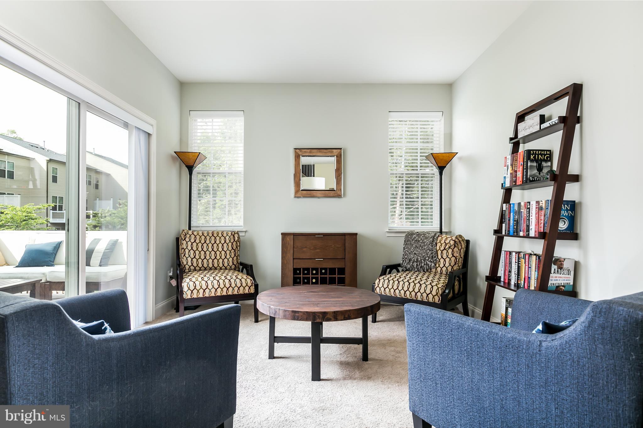 42251 Castle Ridge Square Ashburn, VA 20148 - Photo 13 of 29 Bright family room off kitchen with deck access