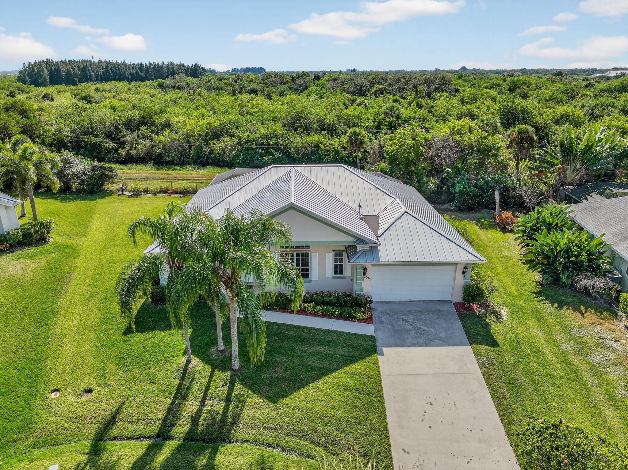 3075 73rd Place Vero Beach, FL 32967 - Photo 46 of 65 an aerial view of a house