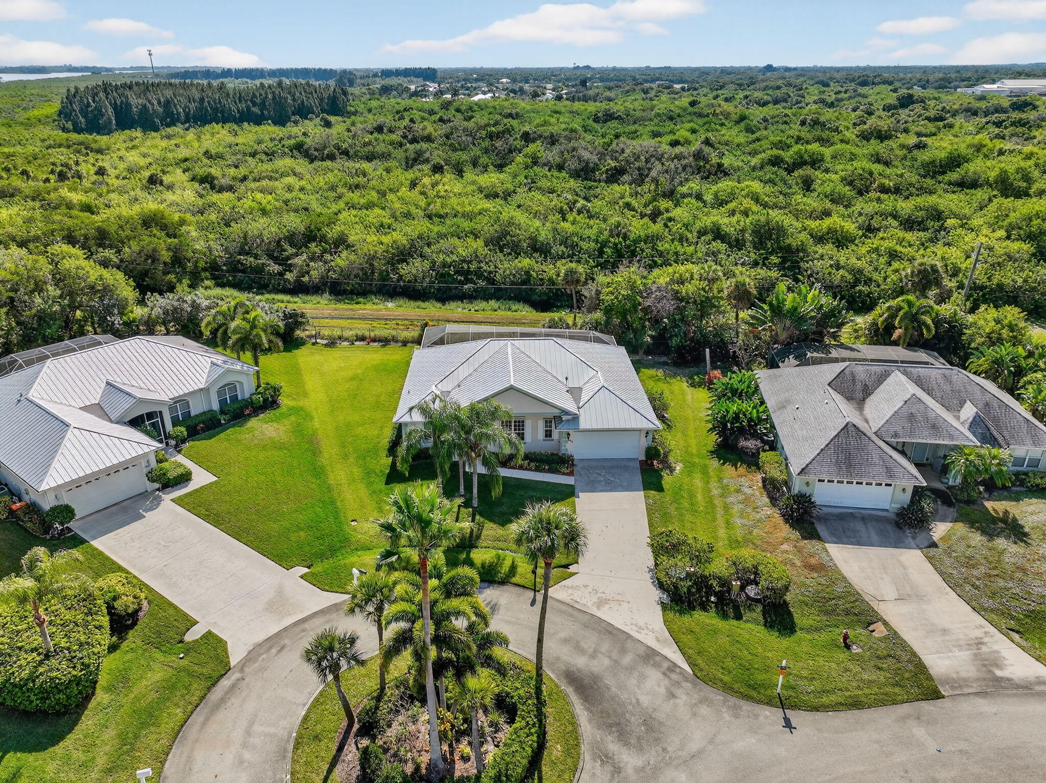 3075 73rd Place Vero Beach, FL 32967 - Photo 48 of 65 an aerial view of a house with a yard