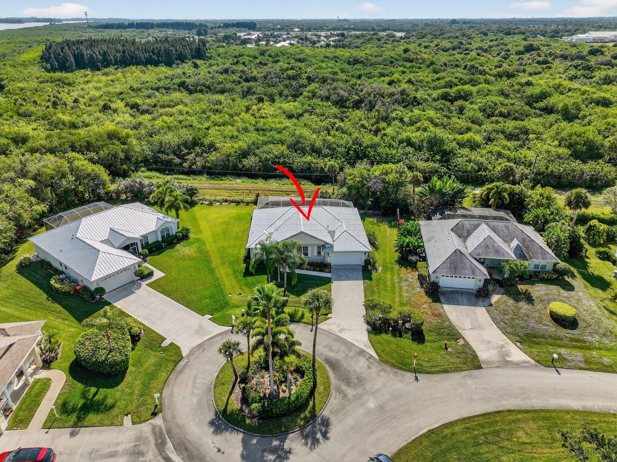 3075 73rd Place Vero Beach, FL 32967 - Photo 49 of 65 an aerial view of a house with yard swimming pool and outdoor seating