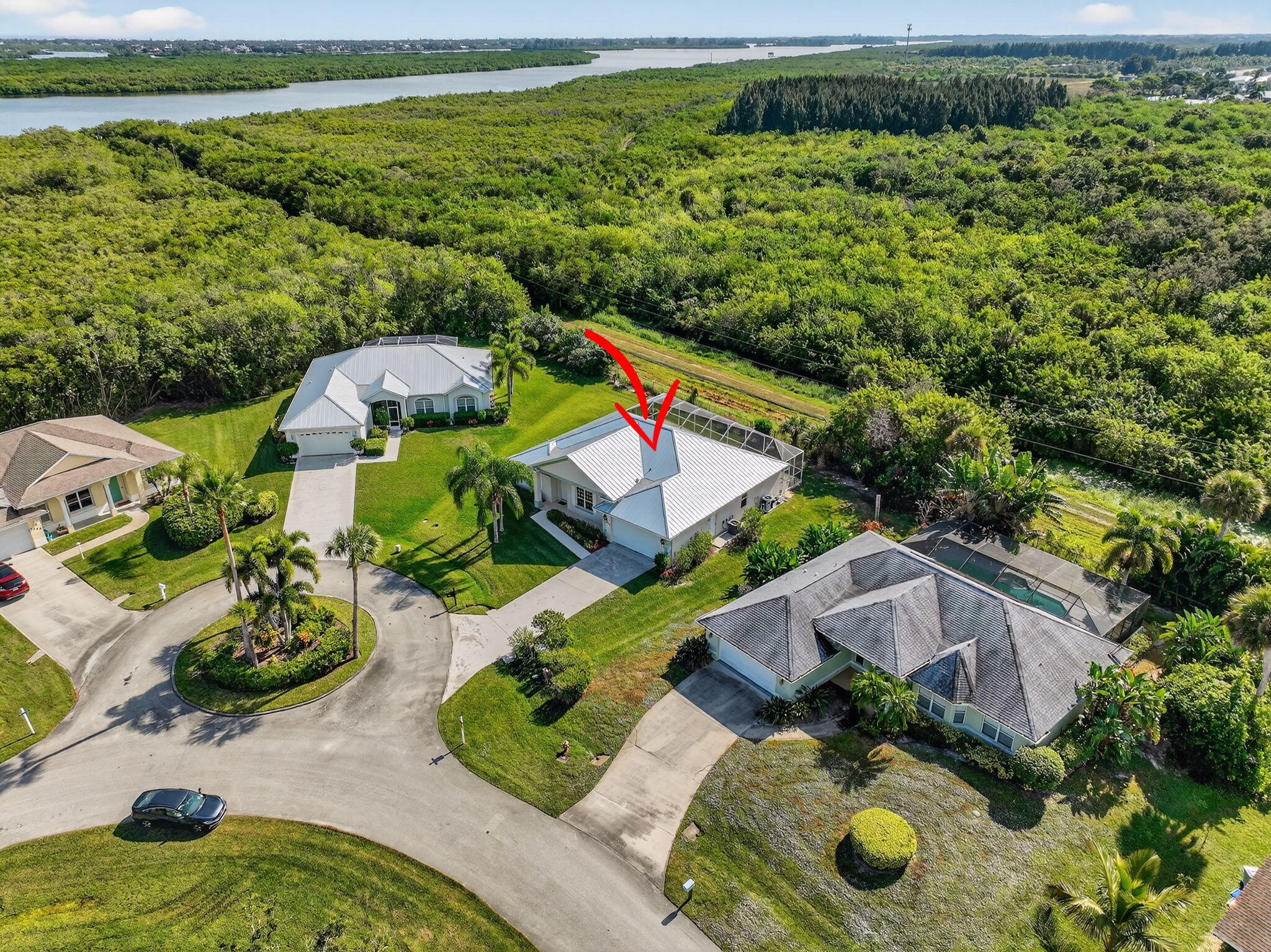 3075 73rd Place Vero Beach, FL 32967 - Photo 50 of 65 an aerial view of a house with yard swimming pool and outdoor seating