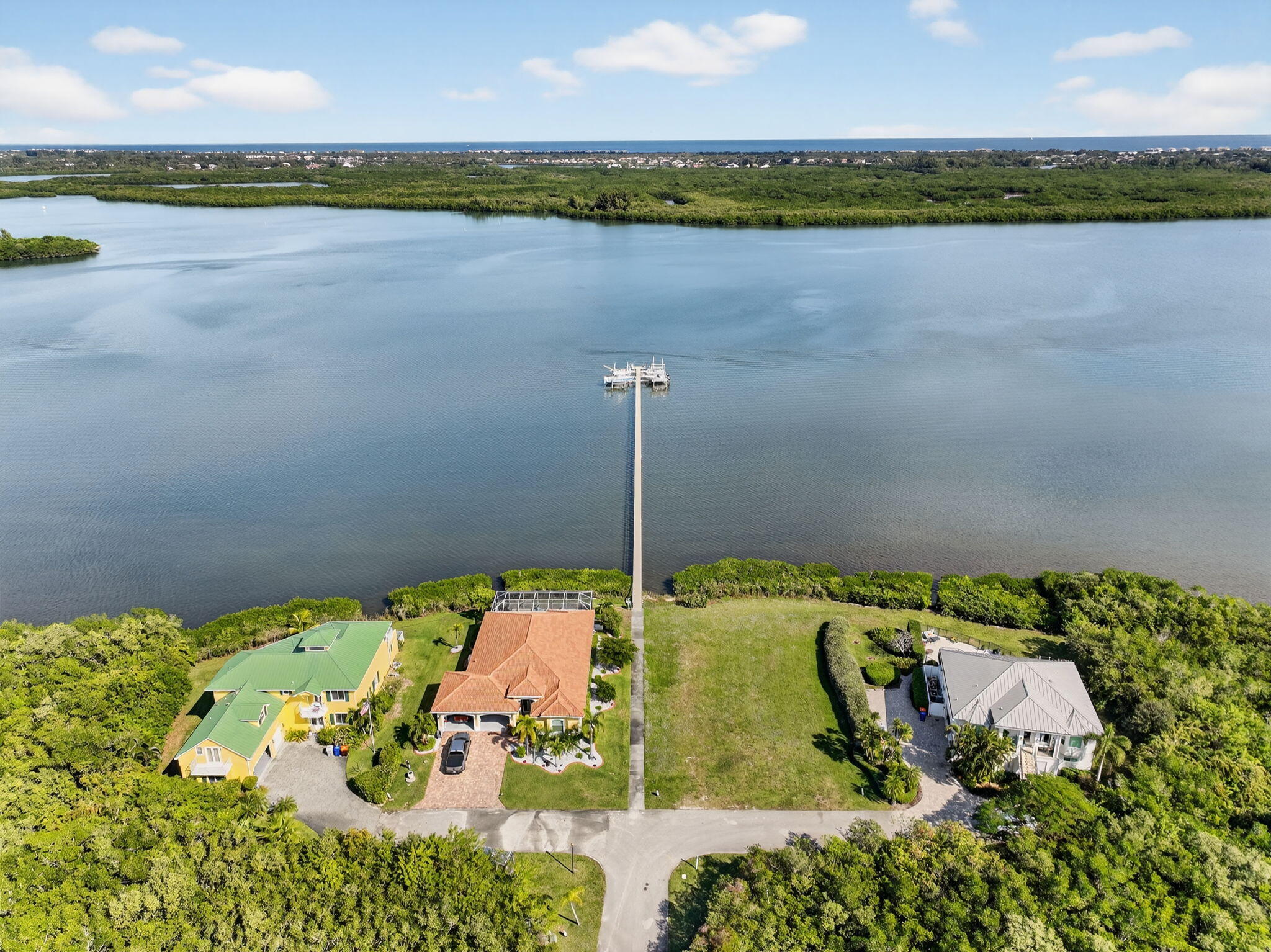 3075 73rd Place Vero Beach, FL 32967 - Photo 61 of 65 a view of a lake from a balcony