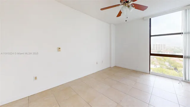 a view of an empty room and window