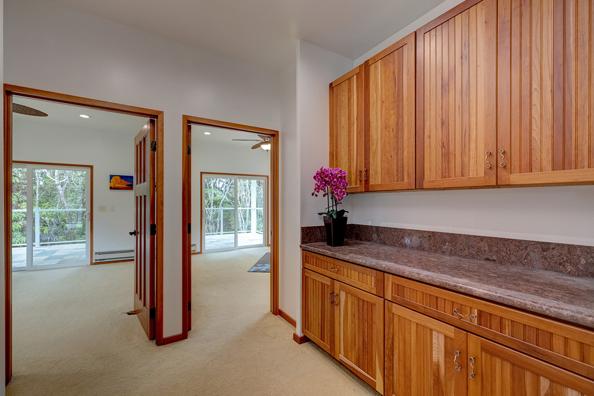19-4221 Haunani Road Volcano, HI 96785 - Photo 14 of 30 a kitchen that has a sink and cabinets