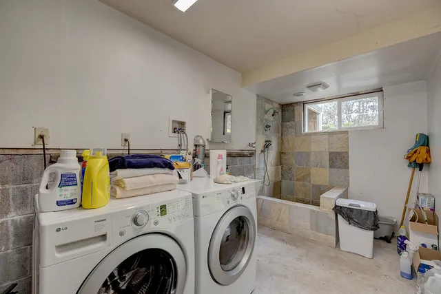 a utility room with dryer and washer