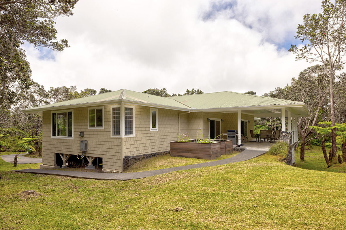 19-4221 Haunani Road Volcano, HI 96785 - Photo 23 of 30 a view of a house with swimming pool and sitting area