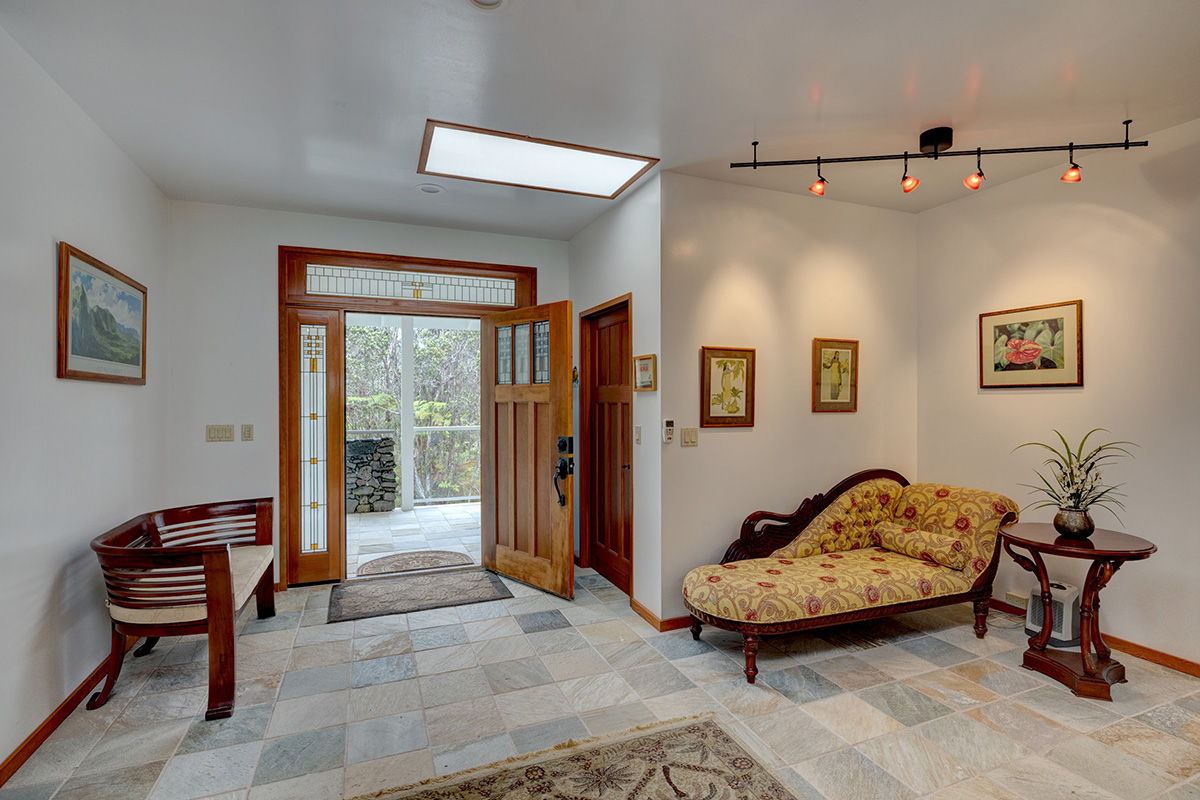 19-4221 Haunani Road Volcano, HI 96785 - Photo 4 of 30 a living room with furniture and a potted plant