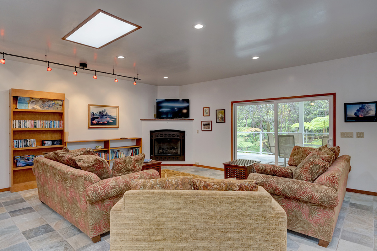 19-4221 Haunani Road Volcano, HI 96785 - Photo 7 of 30 a living room with furniture and a fireplace