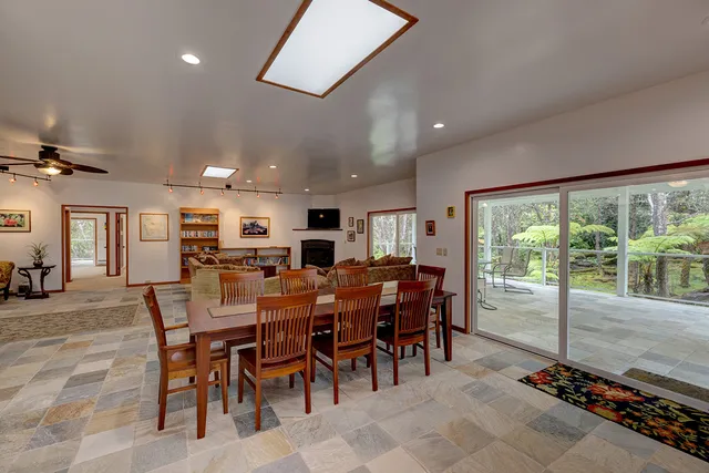 a view of a dining area with furniture window and wooden floor